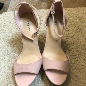 Pink suede high heels.